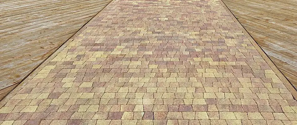 Geometric paver driveway installation at a Clermont, FL home.