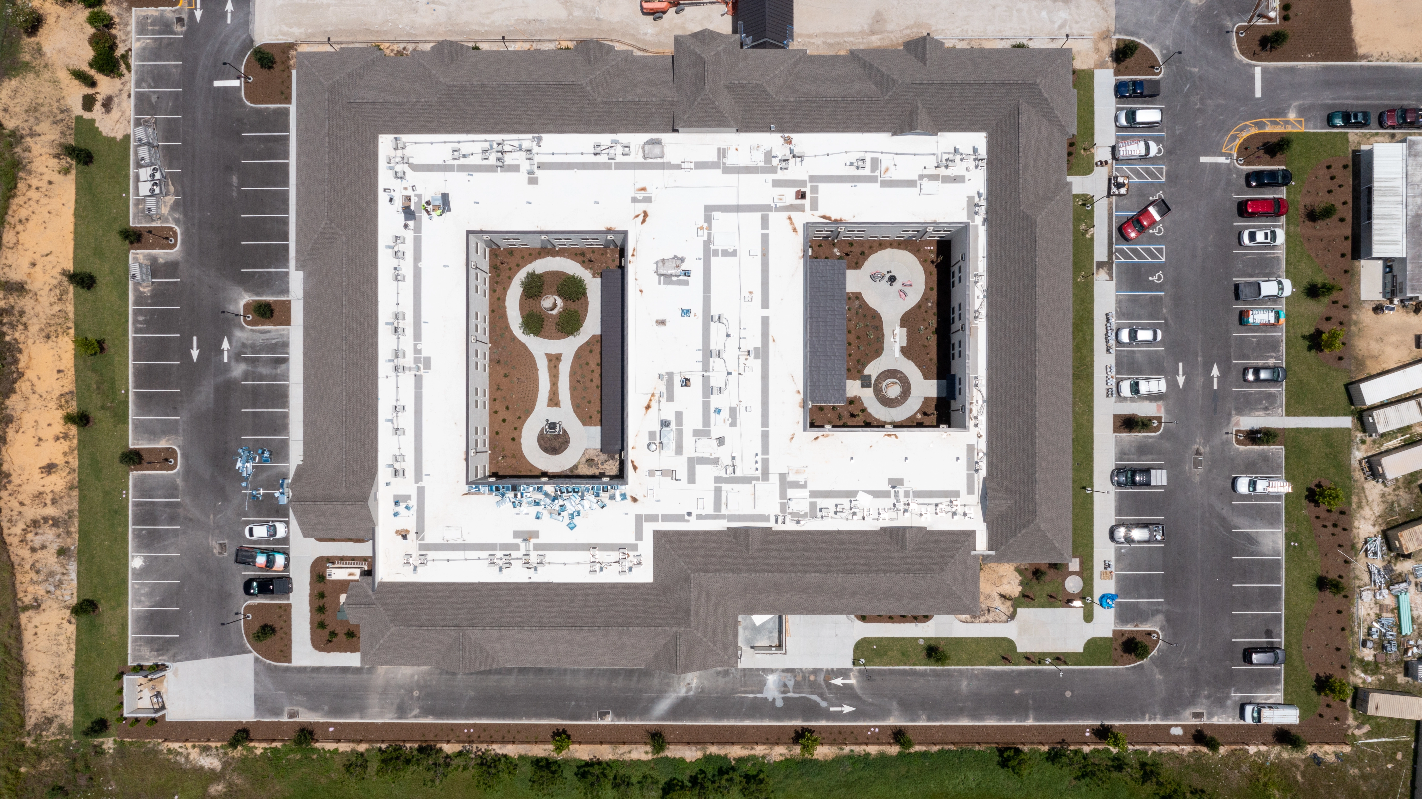 Tropical landscaping installed in the courtyard of a local hotel in Winter Garden, FL..